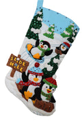 Penguins at Play finished Bucilla felt Christmas stocking with penguins sledding in the snow, front view