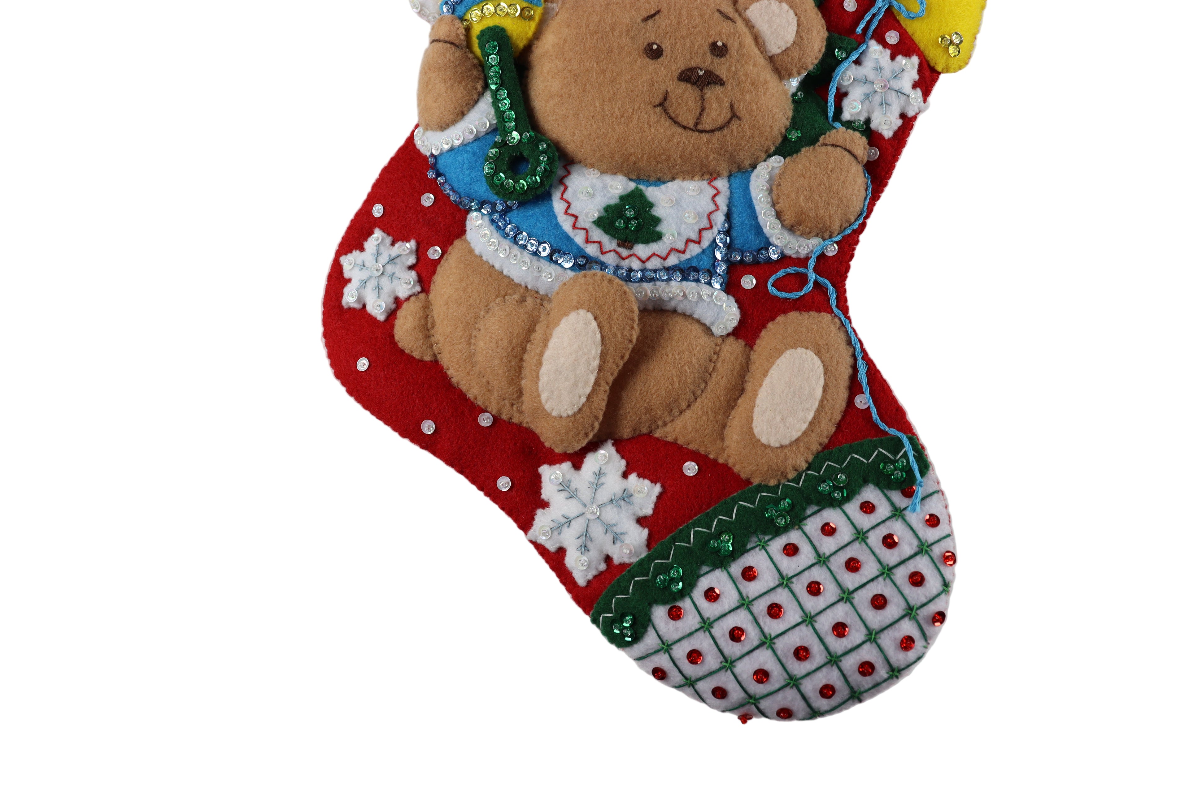 Christmas stocking with a teddy bear design on a white background