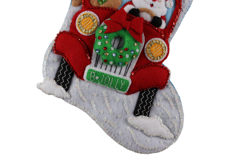 Decorative Christmas stocking with Santa Claus and wreath design