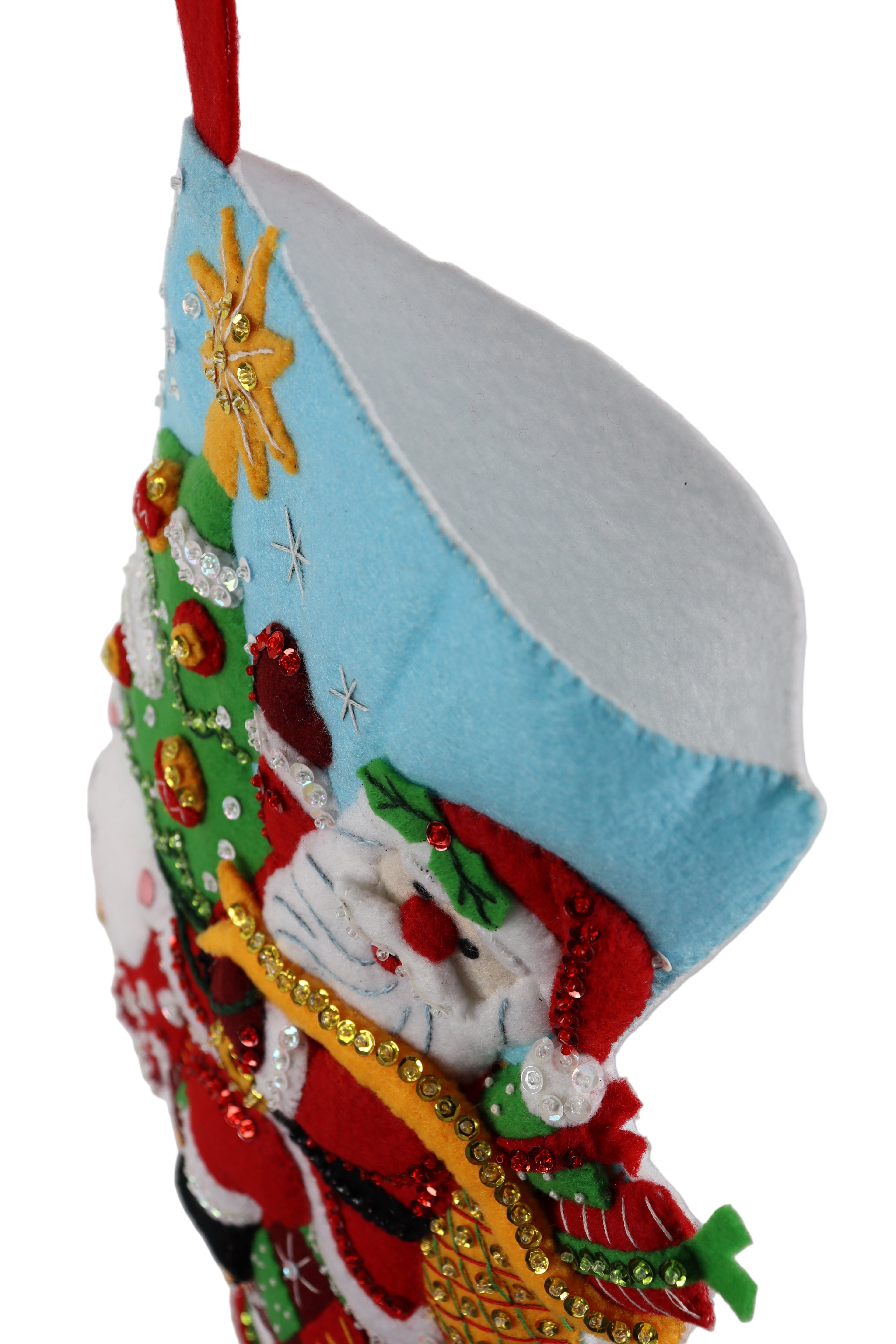 Decorative Christmas stocking with Santa Claus on a white background