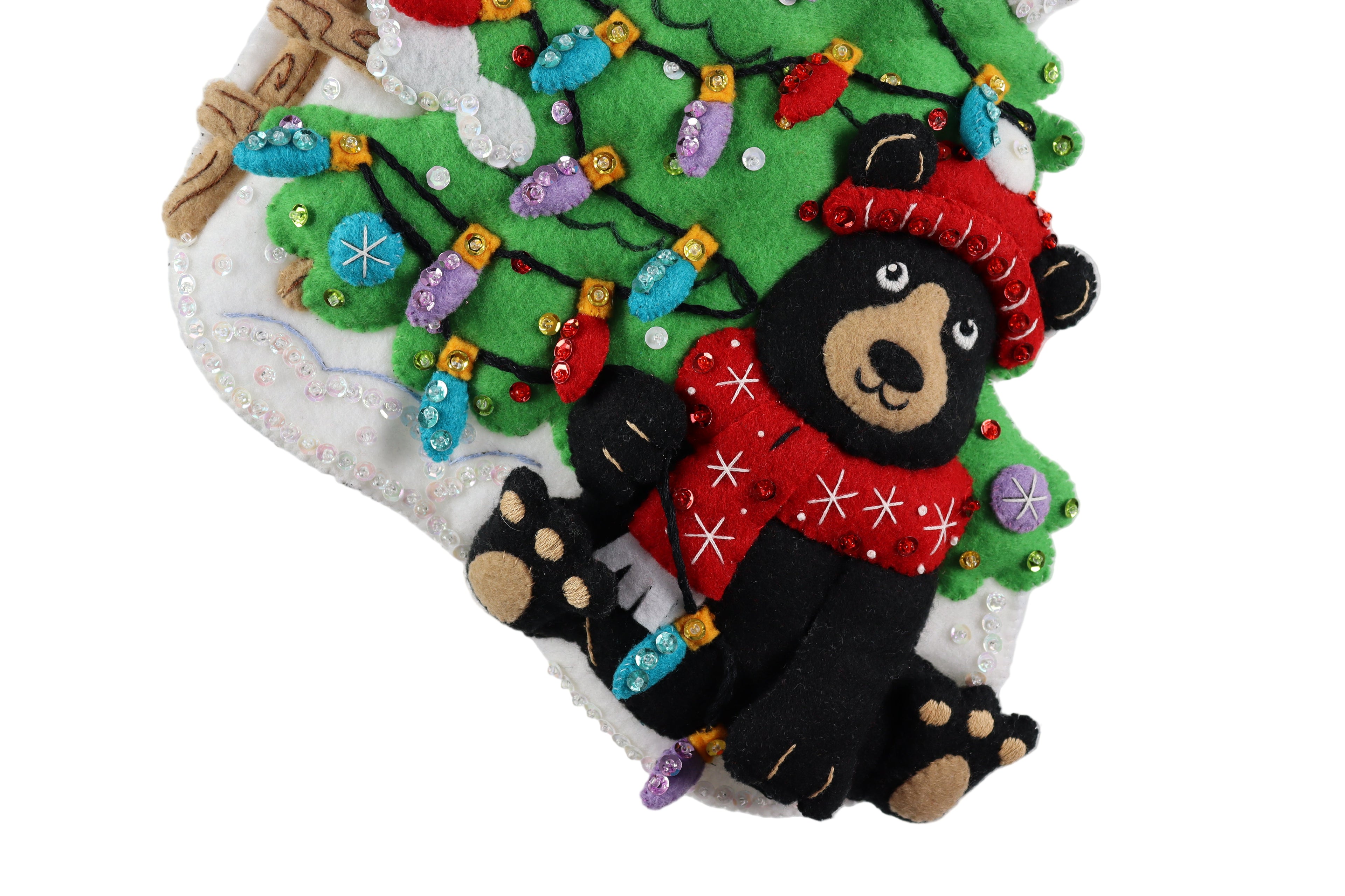 Felt Christmas stocking with a bear and tree