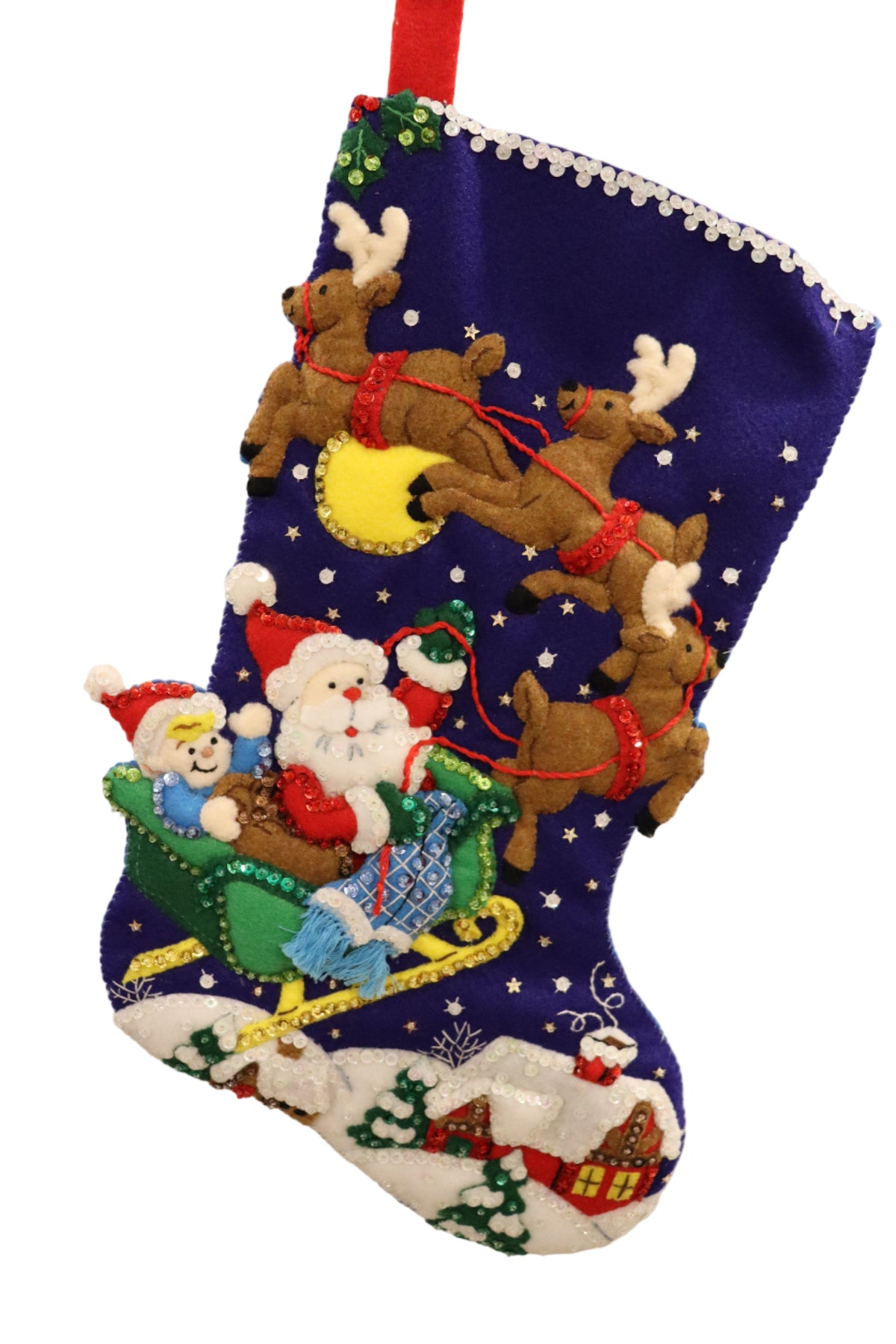 Finished Sleigh Ride with Santa Bucilla felt Christmas stocking: Santa and a child in a sleigh pulled by three reindeer past the full moon over a snowy village