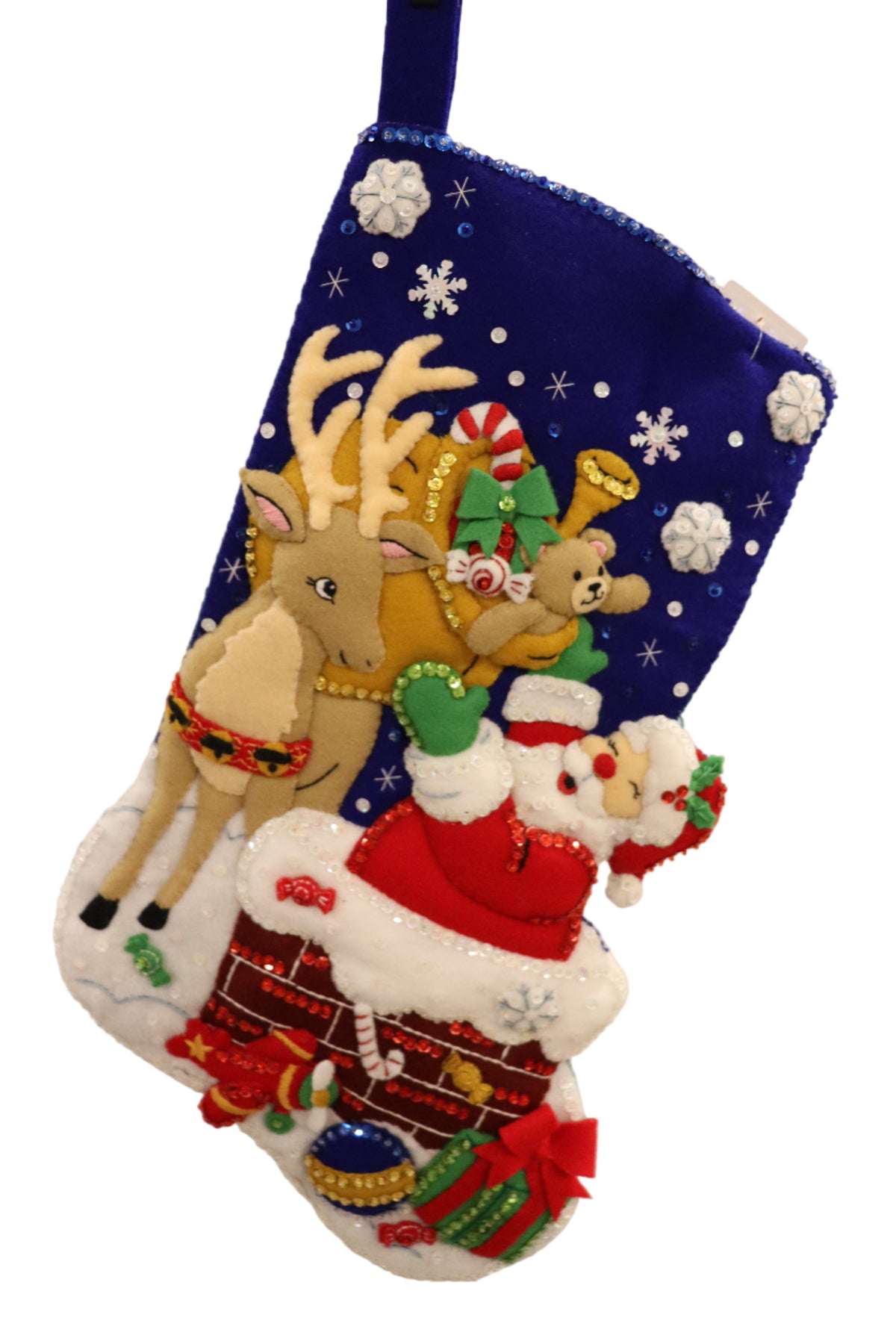 Finished Santa's Toy Delivery Bucilla felt Christmas stocking: Santa climbing down a brick chimney, a reindeer holding a sack of toys and presents under a blue night sky with snowflakes