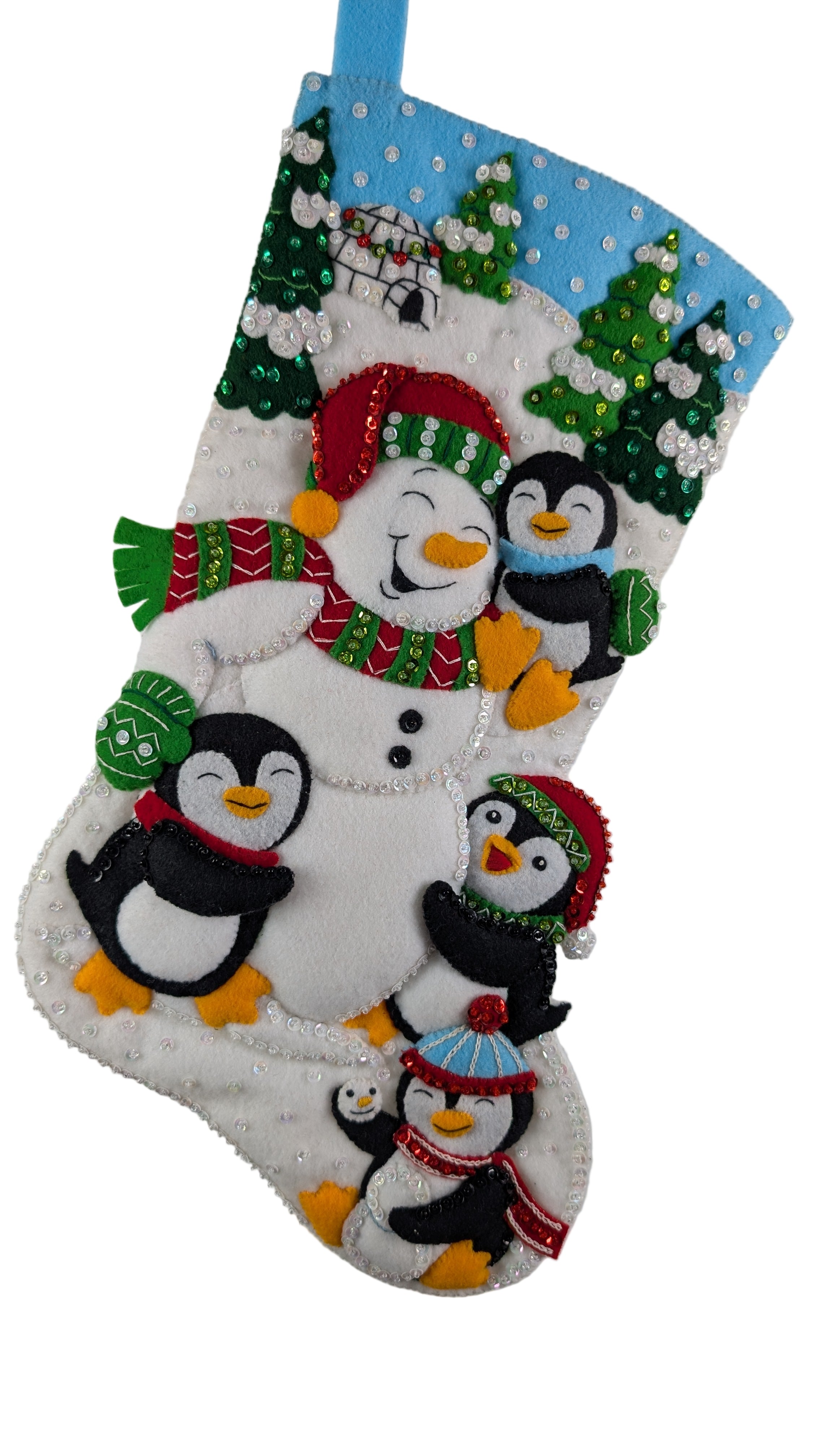 Decorative stocking with penguins and a snowman on a white background